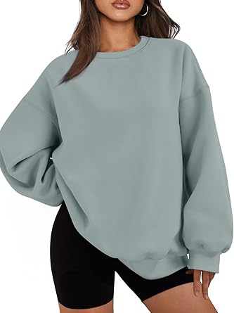 Women's oversized fleece crewneck or hooded sweatshirts and sweaters.